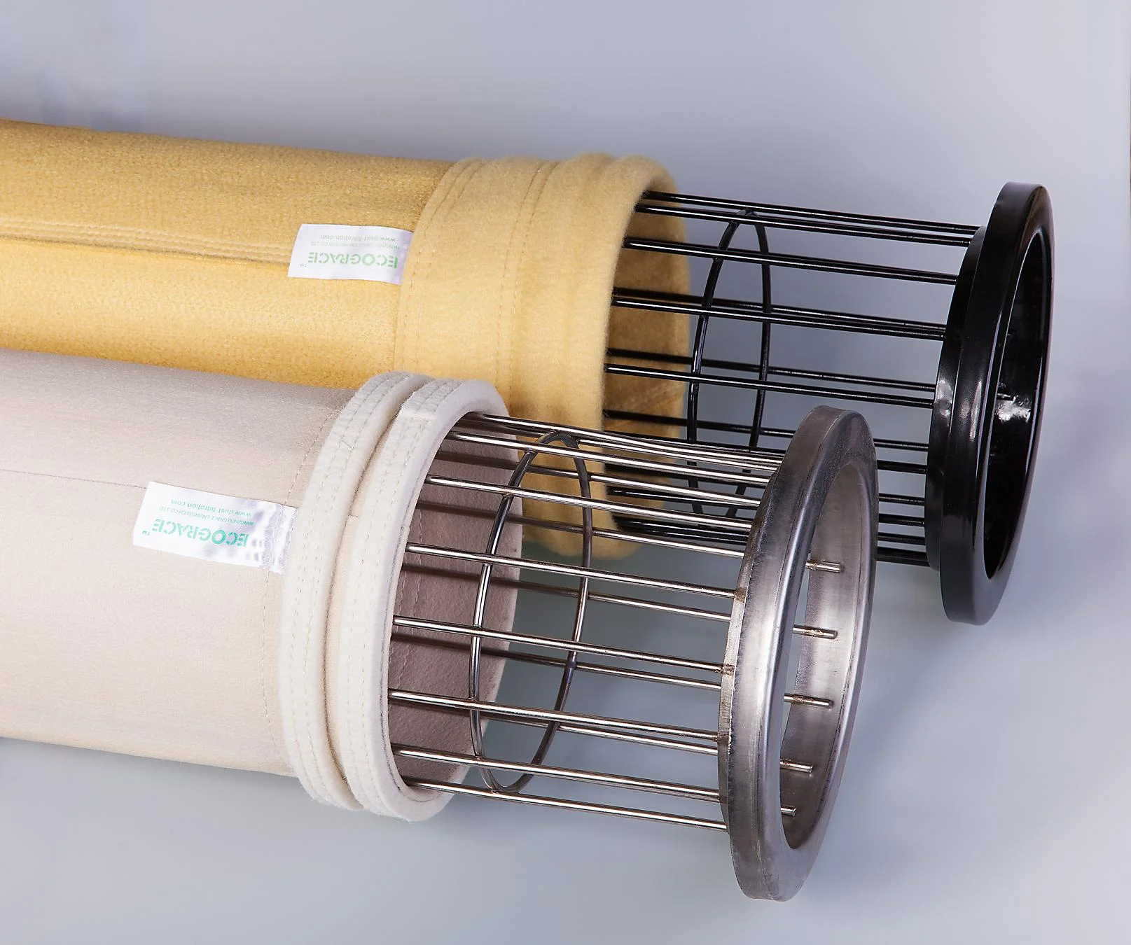 Asphalt plant filter bags comparison - yellow Nomex aramid and white polyester felt filter bags